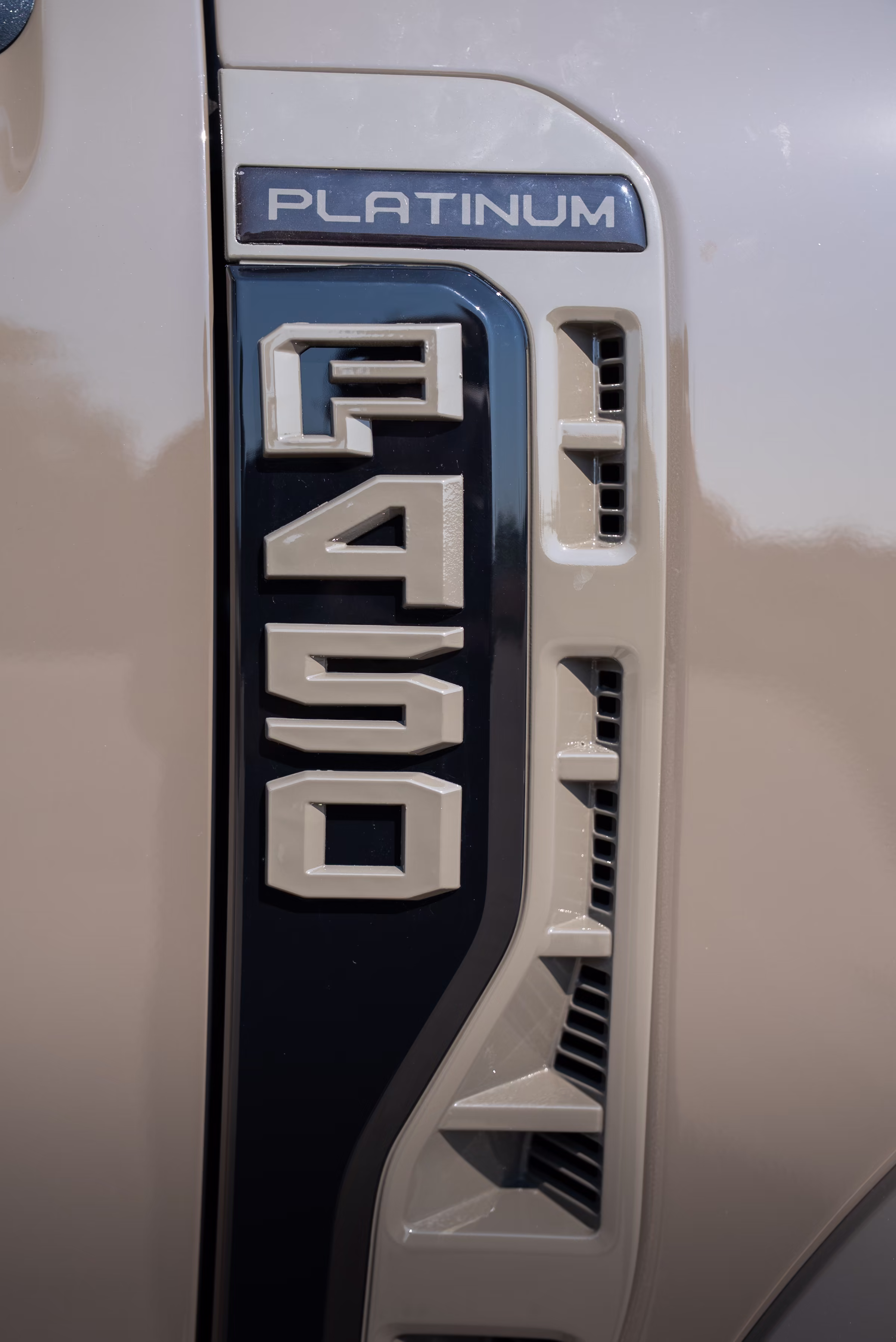 Paint-matched F-450 Platinum fender badge detail