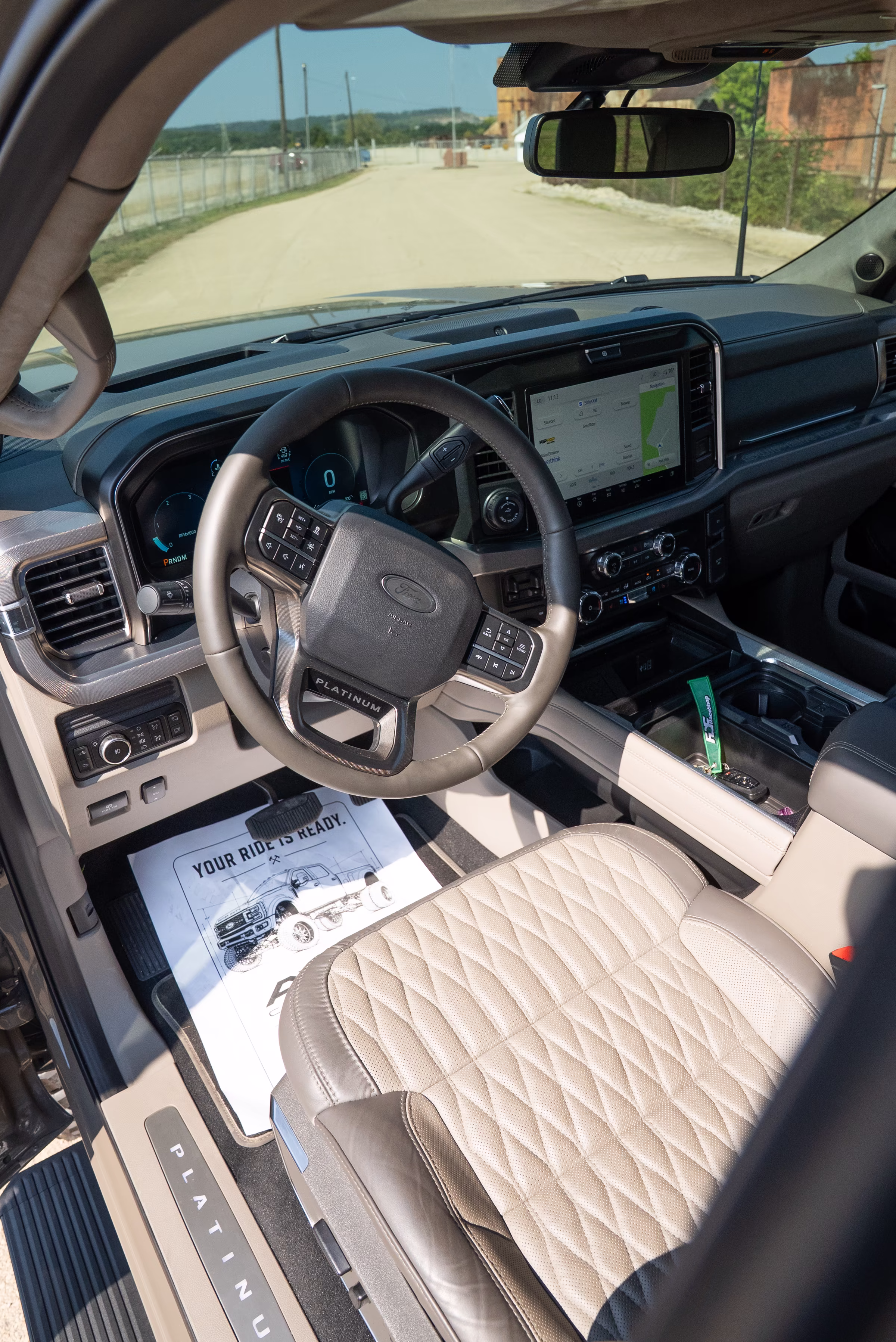 Ford F-450 Platinum cabin with premium leather seating and digital displays
